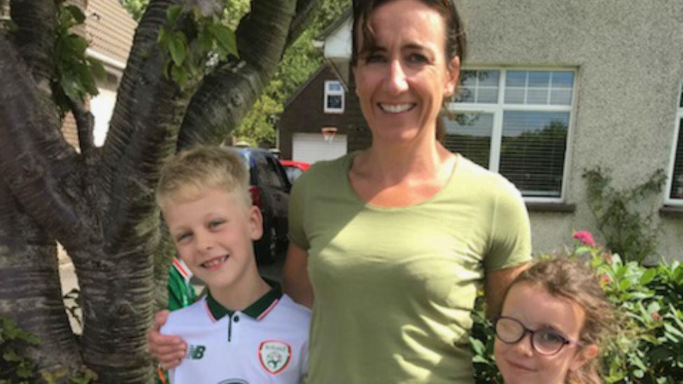 Oliver O'Neill (left) with Aileen Fitzgerald and her daughter.