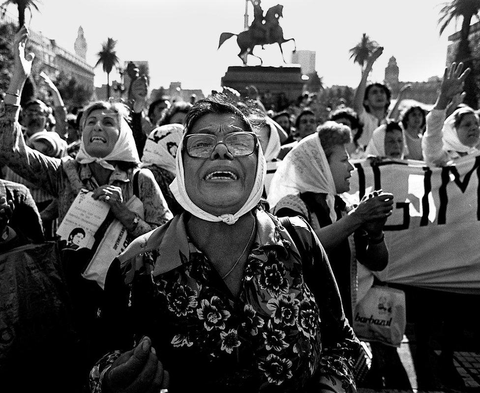 Clara Jurado (C) and other "Madres de Plaza de Mayo" members claim for their missing sons and daughters in 1982