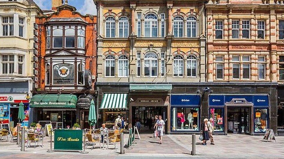 Image shows shop fronts on St Mary's Street in Cardiff town centre