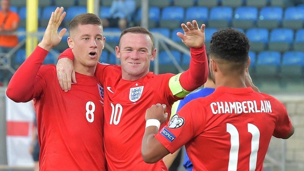 Rooney and his players celebrate