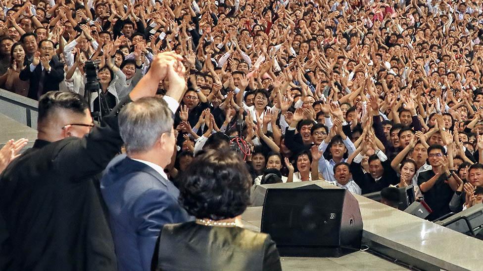 The North Korean crowd burst into applause after being addressed by President Moon Jae-in