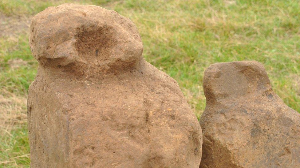 Two carved stones