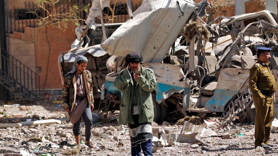 People at site of air raid in Yemeni capital Sanaa on February 5, 2018