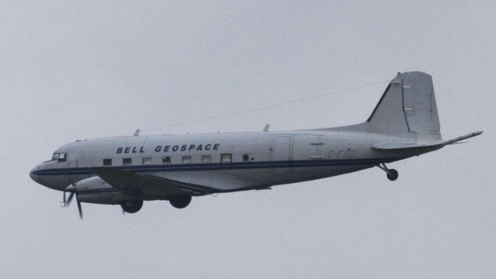 Plane flying over Cornwall