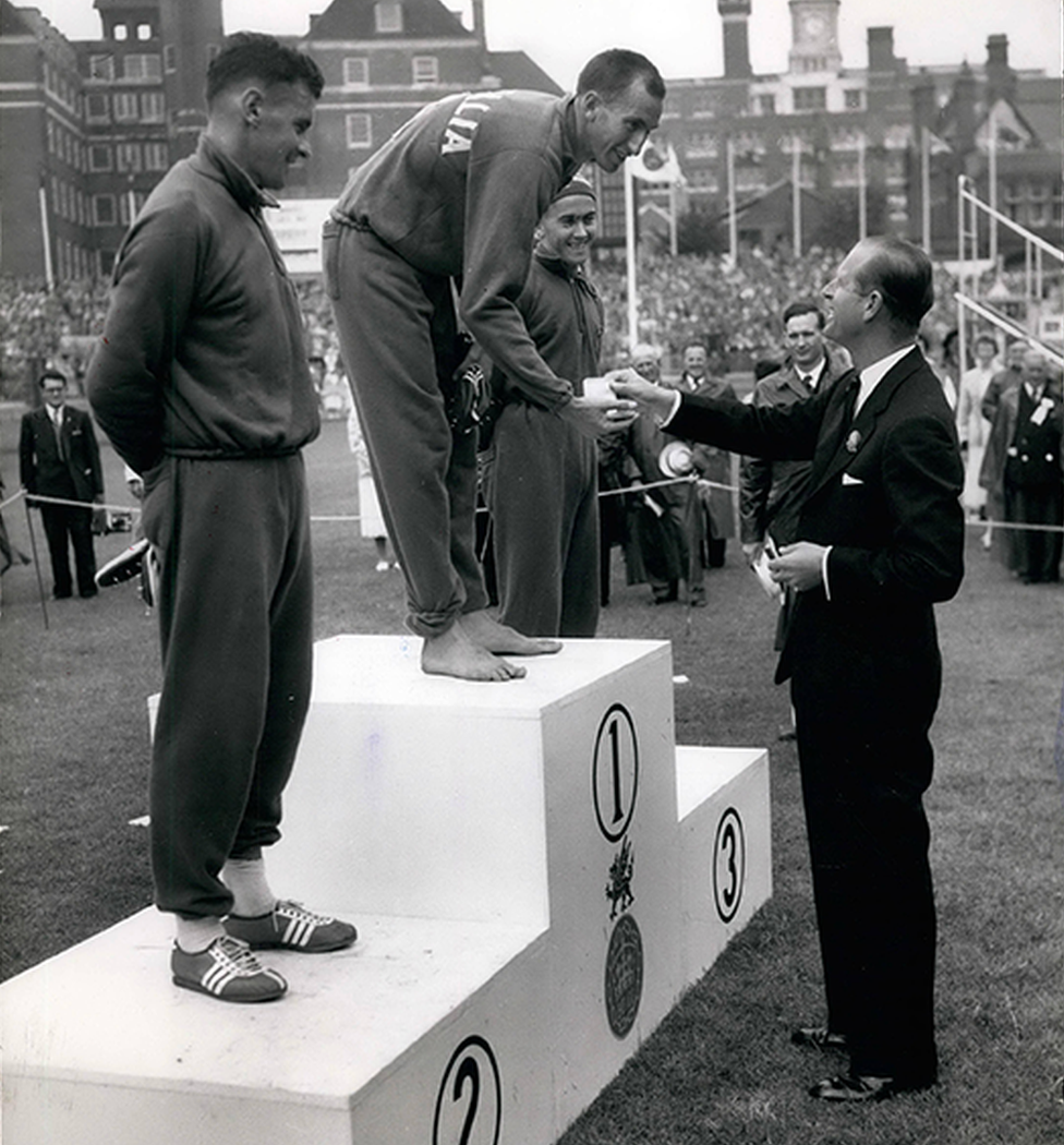 Final Day of Empire Games - the Duke of Edinburgh presenting the Gold Medal to Herb Elliott, of Australia