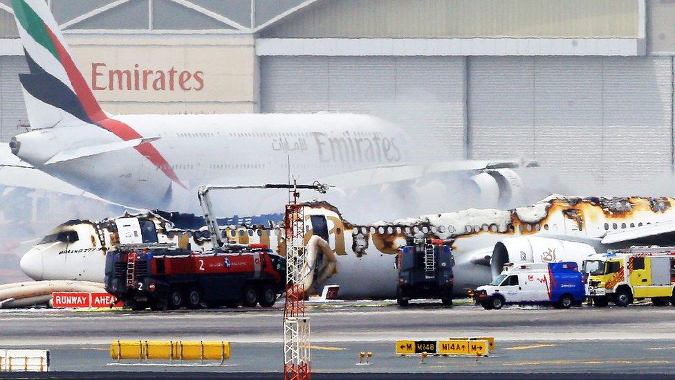 An Emirates airlines Boeing 777-300 A6-EMW plane flight number EK521 from Trivandrum to Dubai lays on the ground in Dubai airport after being gutted by fire due to a mechanical failure at Dubai international airport, Dubai, United Arab Emirates, 3 August 2016.