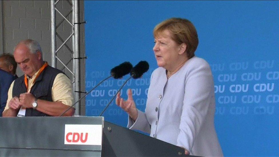 Angela Merkel on stage at event in Zingst, in north-eastern Germany (11 July 2016)