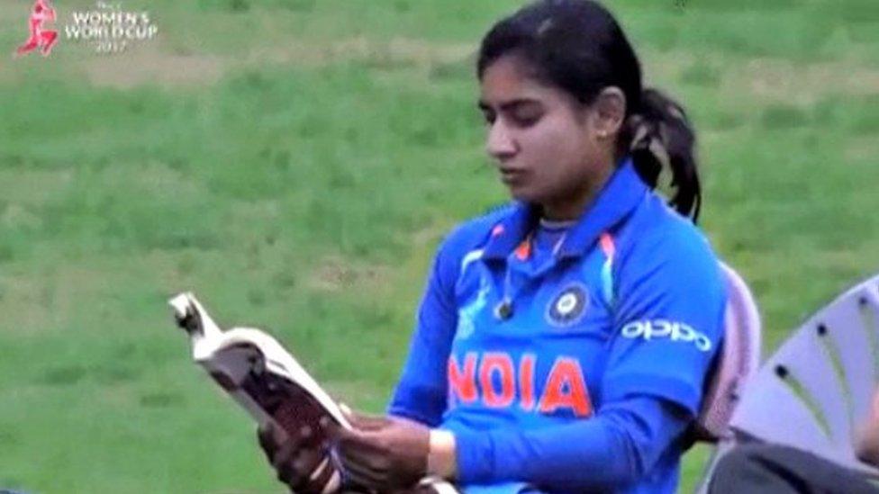 The captain of Indian women's cricket team Mithali Raj reading a book