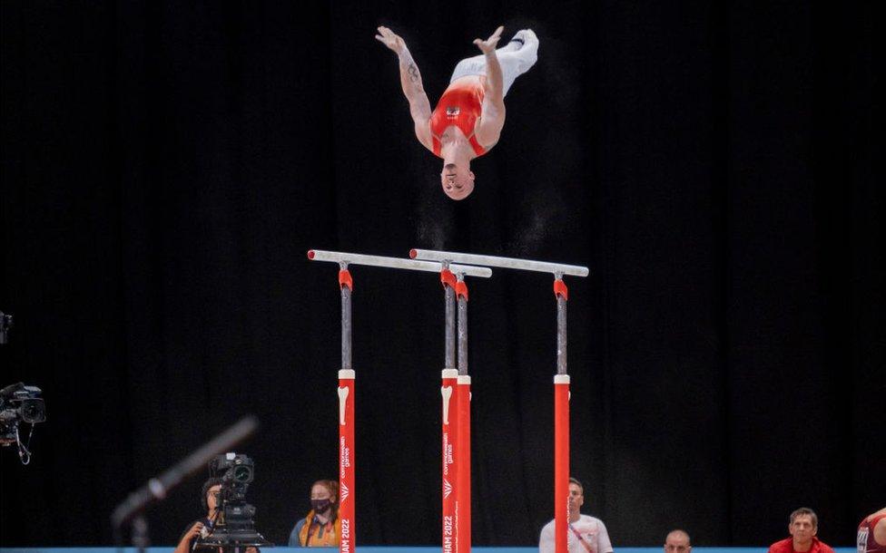 Brinn Bevan on parallel bars