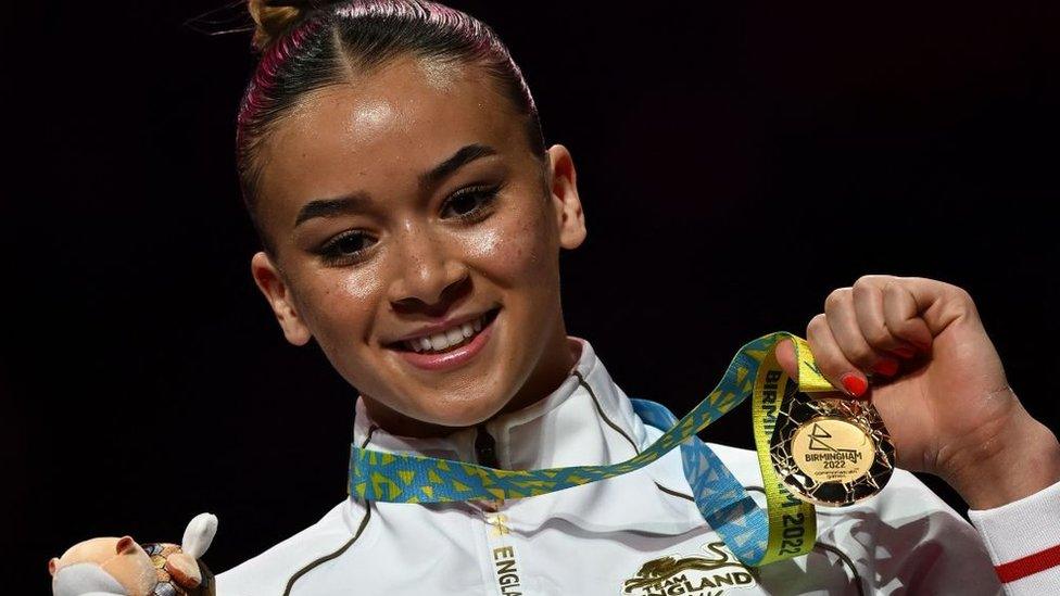 Gold medallist England's Georgia-Mae Fenton poses during the presentation ceremony for the women's uneven bars artistic gymnastics final event at the Arena Birmingham.