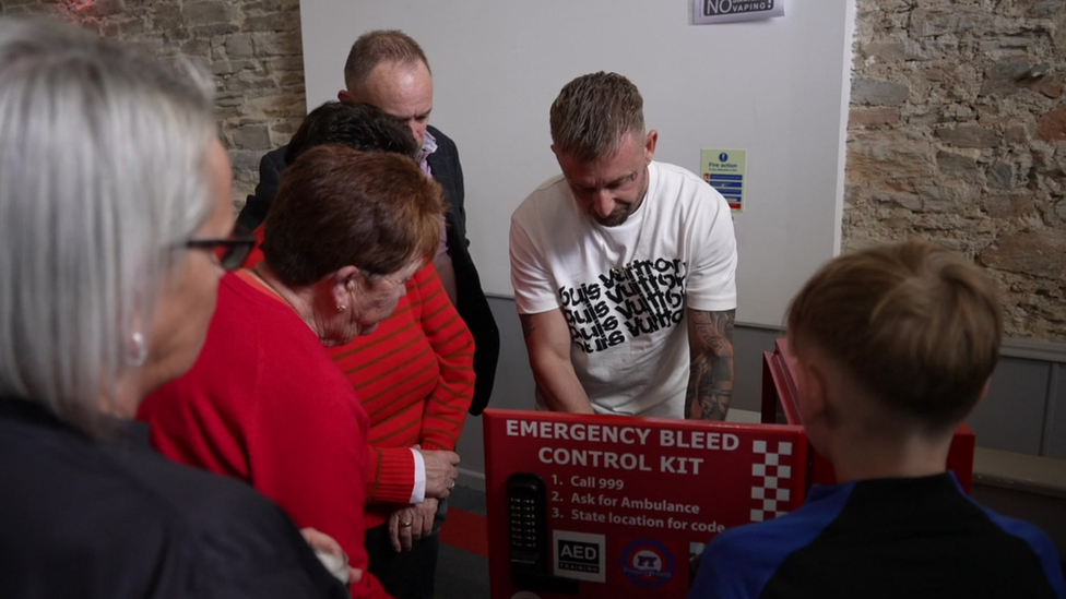 Carl Scott demonstrates the bleed kit