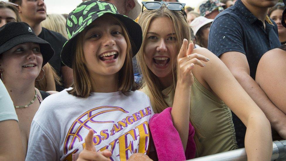 Festival goers at Isle Of Wight Festival 2021 at Seaclose Park on September 18, 2021 in Newport, Isle of Wight