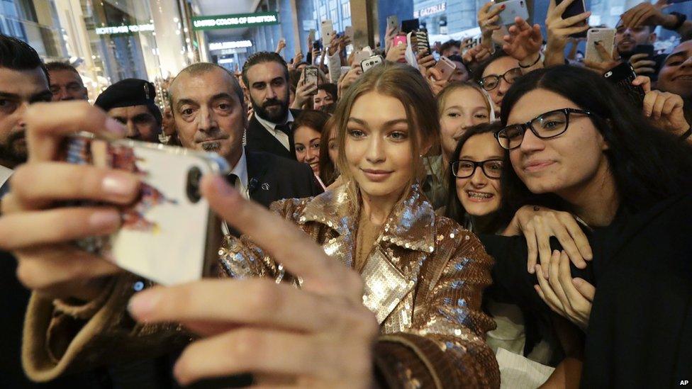 Gigi Hadid with some fans