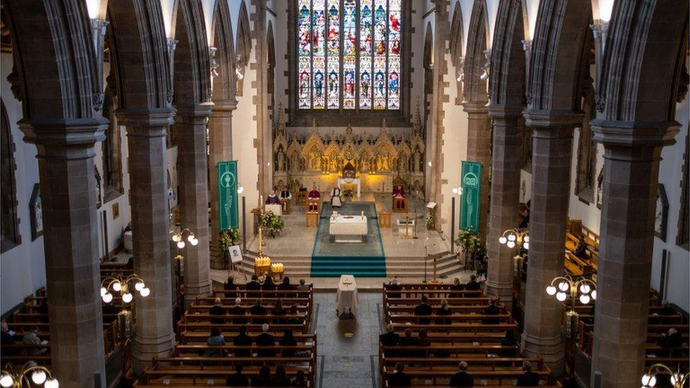 Around 100 mourners attended the funeral service at St Eugene's Cathedral.