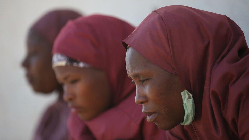 Parents wait outside the Government Science where gunmen abducted students in Kankara, in northwestern Katsina state, Nigeria December 15, 2020, in at attack claimed by Boko Haram