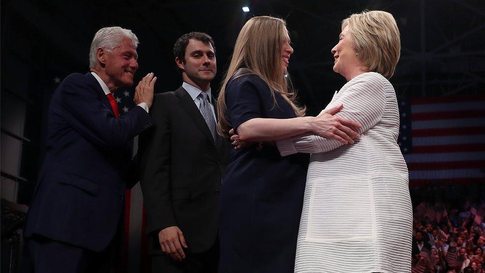 Former US President Bill Clinton, Marc Mezvinsky and Chelsea Clinton greet Democratic presidential candidate former Secretary of State Hillary Clinton during a primary night event on June 7, 2016 in Brooklyn, New York