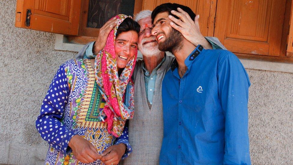 Kashmiri pandit Makhan Lal with Muslim friends