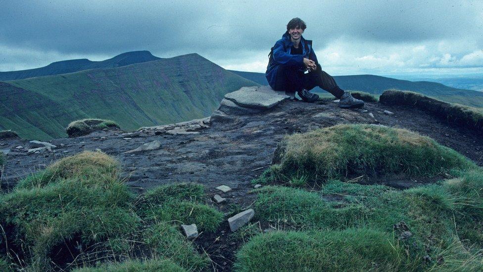 Myrddyn Phillips sat on the summit of Fan y Big