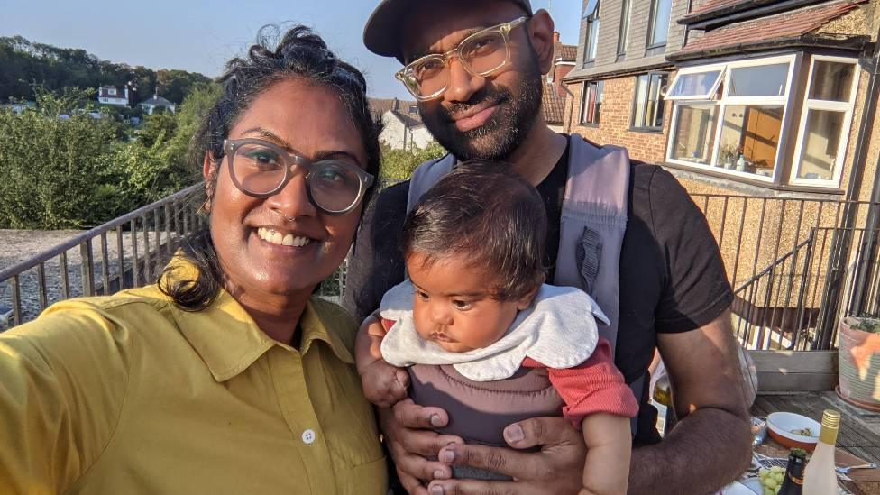 Evie Sanassy with her parents