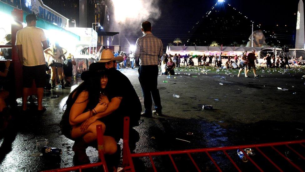 woman and man crouching