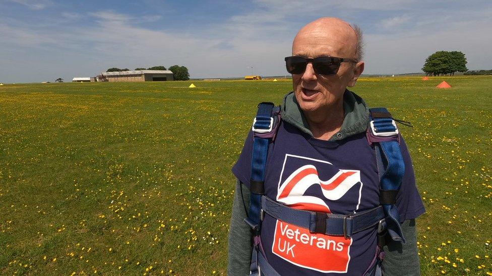 Mark Pile standing in a field