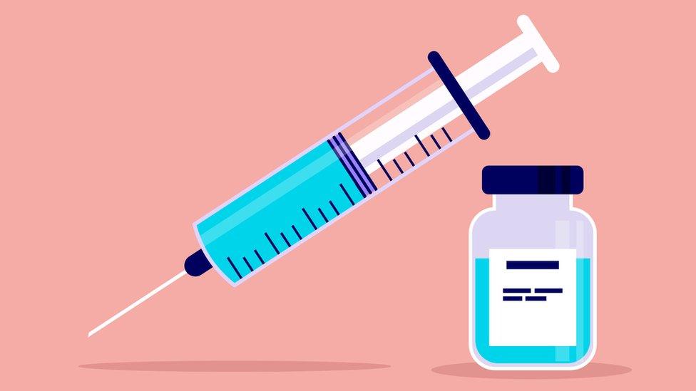 illustration of a needle and vaccine vial