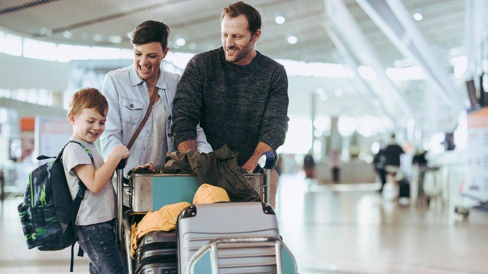 A family at the airport