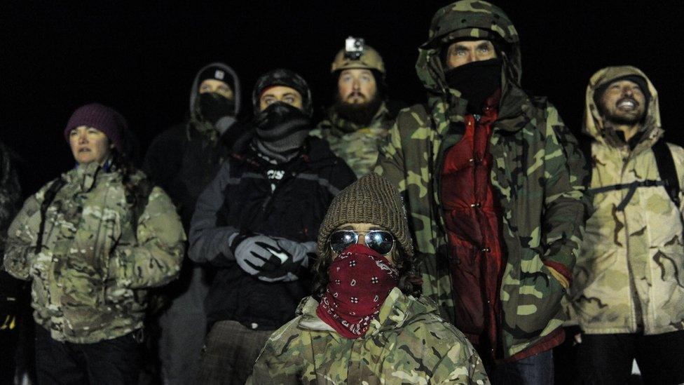 Veterans have a demonstration on Backwater bridge during a protest against plans to pass the Dakota Access pipeline near the Standing Rock Indian Reservation, near Cannon Ball, North Dakota, U.S.