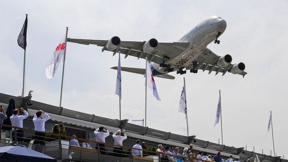 An Airbus A380 jet airliner prepares to land during the International Paris Air Show at Le Bourget, north of Paris, on June 20, 2017