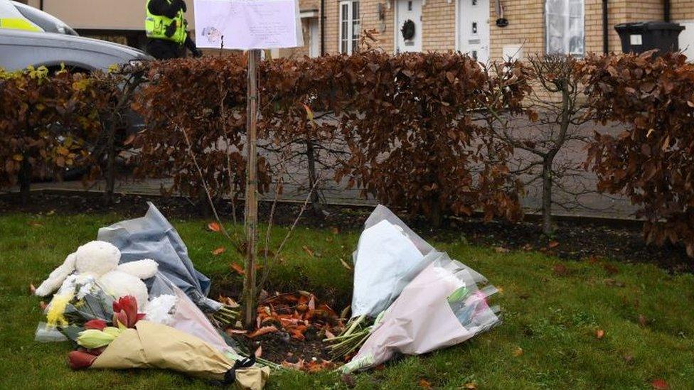 Tributes under a tree