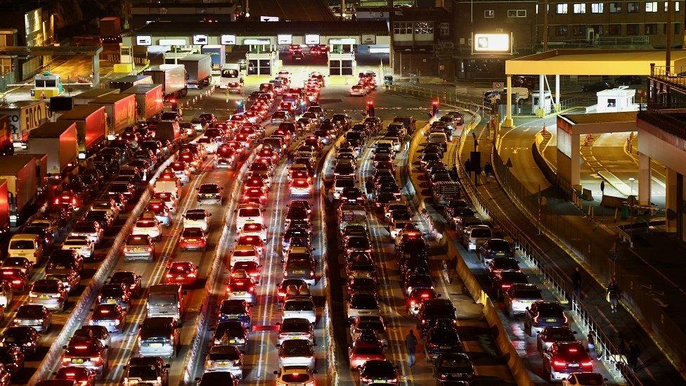 Vehicles queue up at the entrance of Port of Dover, ahead of travel restrictions between France and Britain, amid the coronavirus disease (COVID-19) pandemic