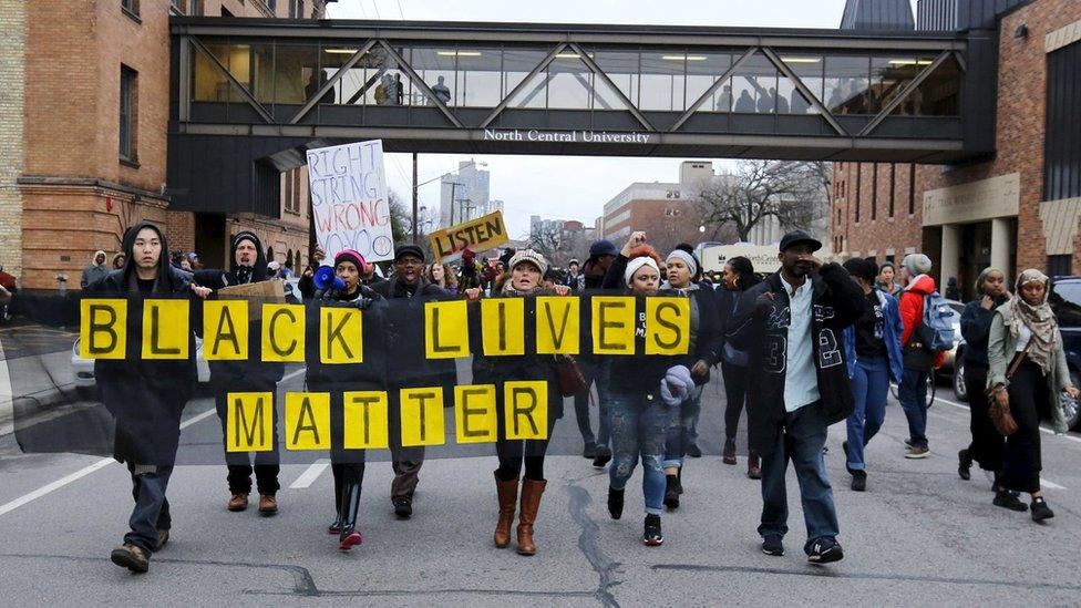 Protestors march during a rally in Minneapolis, Minnesota 30 March 2016