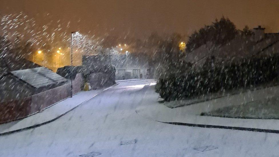 Snowy street in a light blizzard