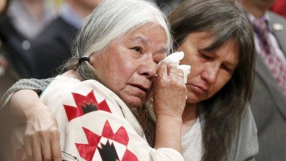 Attendees embrace during the Truth and Reconciliation Commission of Canada closing ceremony at Rideau Hall in Ottawa 3 June 2015