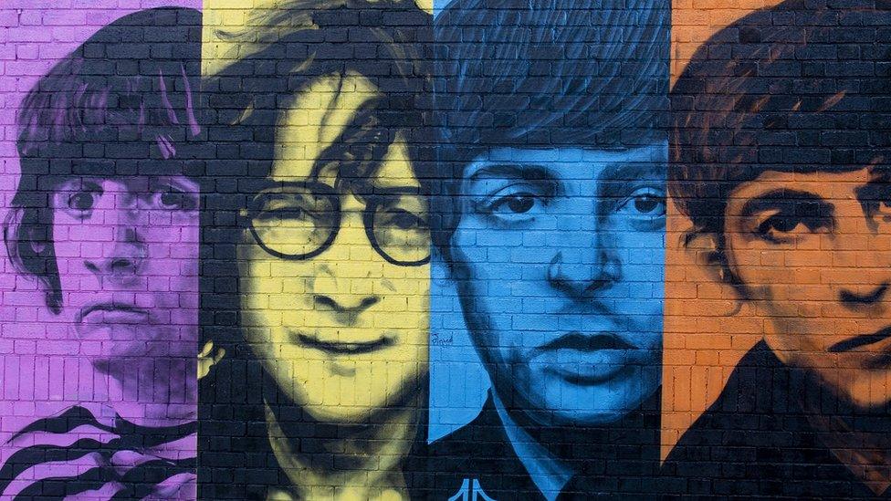 A mural of the Beatles, painted on a wall in the Baltic Triangle area of their home city, Liverpool