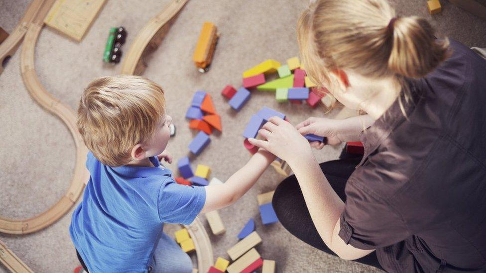 Child playing with toys