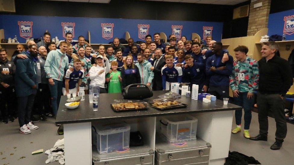 Ed Sheeran celebrating with Ipswich players