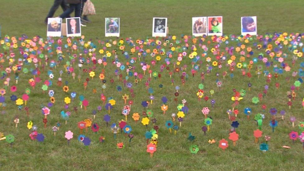 Hand made flowers representing the thousands of people who have died of a drugs overdose in the UK