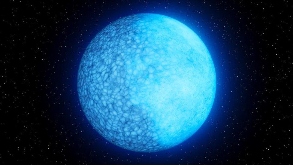 An illustration shows a blue-tinted white dwarf star.