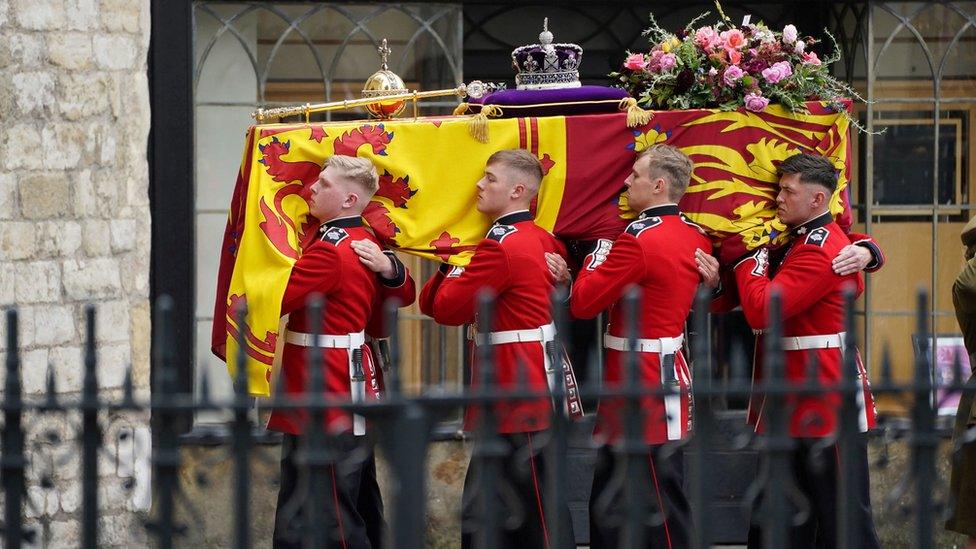 Pallbearers carrying the Queen's coffin