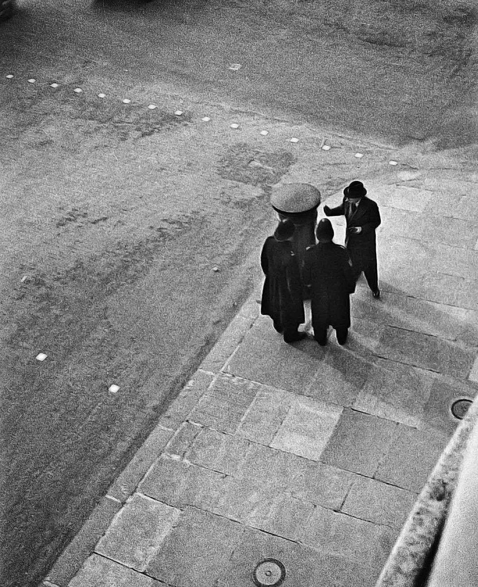 Policemen seen from above on Charlotte Street, London 1934