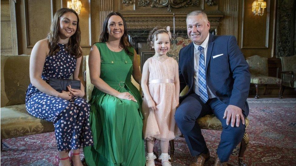 Mila Sneddon, aged five, with her sister Jodi Sneddon (left), mother Lynda Sneddon and father Scott Sneddon, after meeting the Duchess of Cambridge at the Palace of Holyroodhouse in Edinburgh.