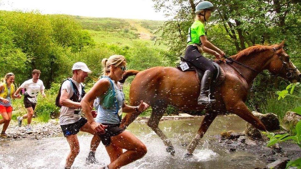 The race pits man against horse over a 22.5-mile course in Llanwrtyd Wells, Powys