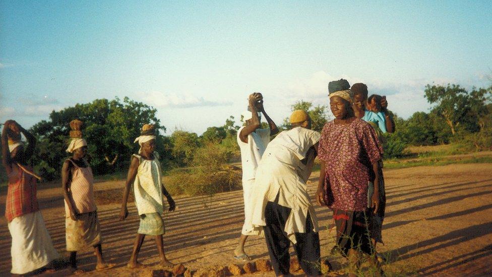 Villagers build "diguettes" to fight desertification and improve crop yield