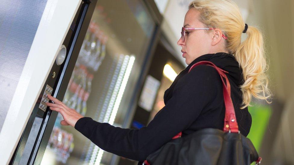 Person uses a vending machine