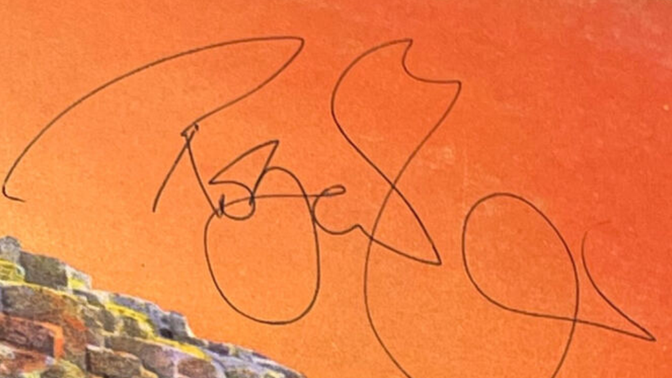 The signed album sleeve