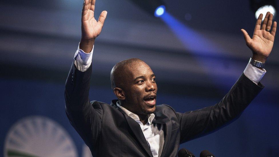 Mmusi Maimane, the newly elected leader of South Africa's main opposition Democratic Alliance (DA) party, gestures as he gives his maiden speech following his election in Port Elizabeth, South Africa, on May 10, 2015