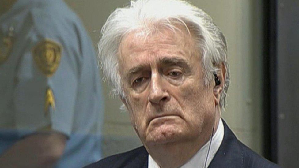 Radovan Karadzic listens to the verdict at the International Criminal Tribunal for Former Yugoslavia (ICTY) in The Hague