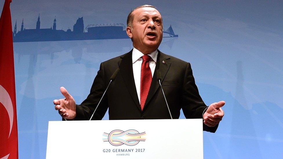 Turkey's President Recep Tayyip Erdogan attends the final press conference on the second day of the G20 Summit in Hamburg, Germany, 8 July 2017