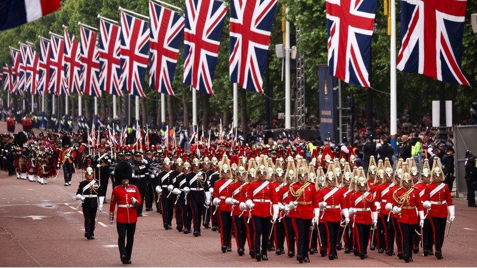 Members of military take part in a parade during the Platinum Jubilee Pageant